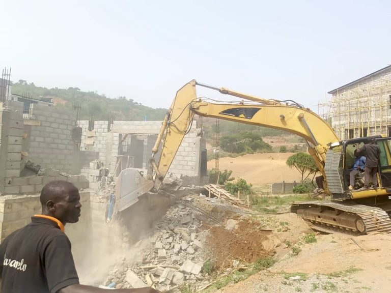 AMMC Cracks Down on Developer Over Green Area Encroachment, Begins Demolition in Guzape